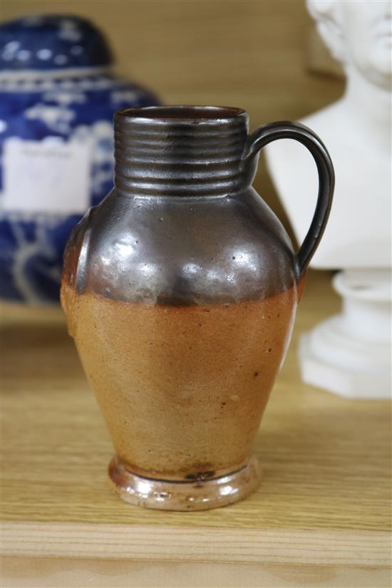 A GI stoneware jug, a Doulton jug and two others 8cm - 22cm